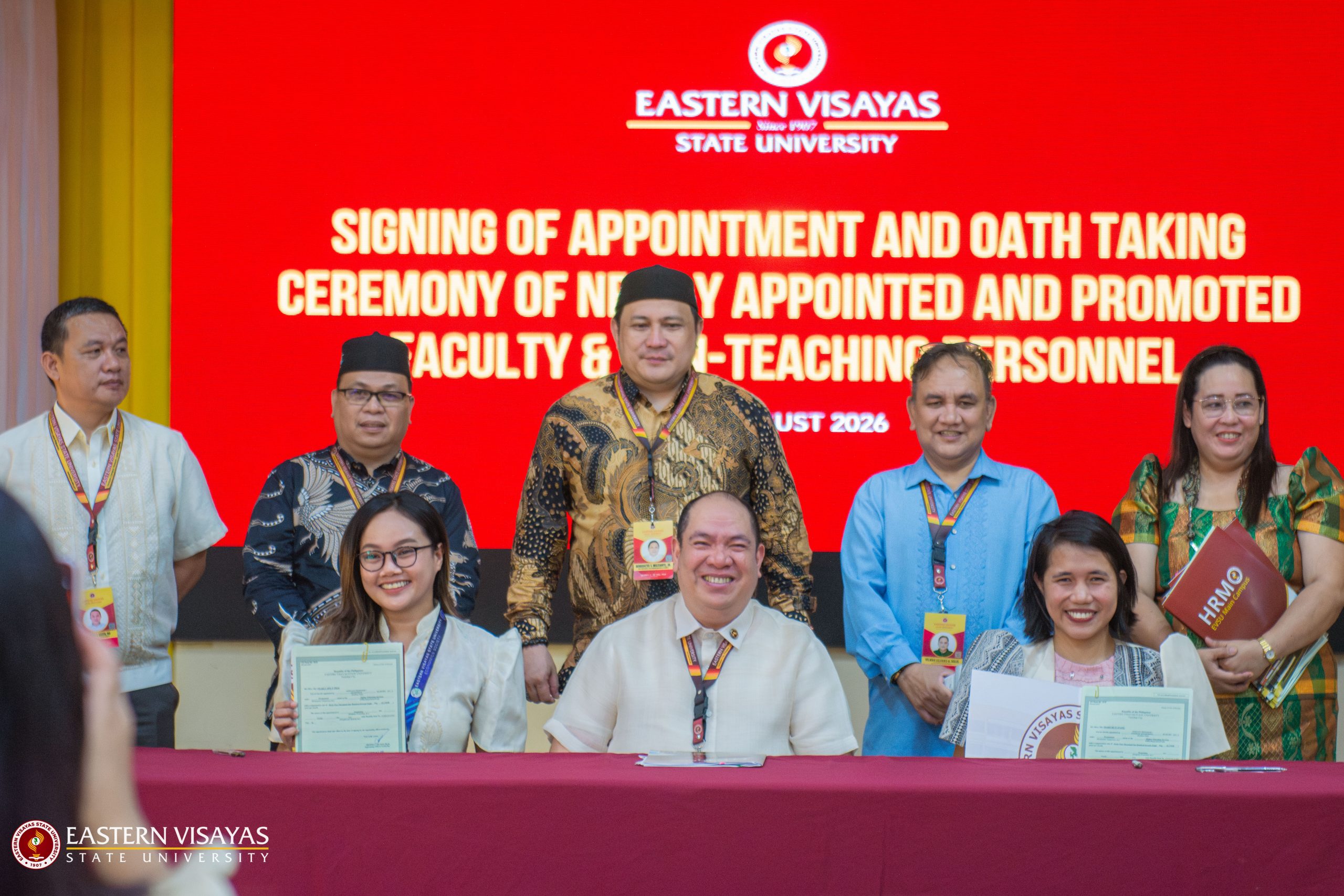 Newly appointed EVSU personnel and promoted faculty take oath during flag-raising