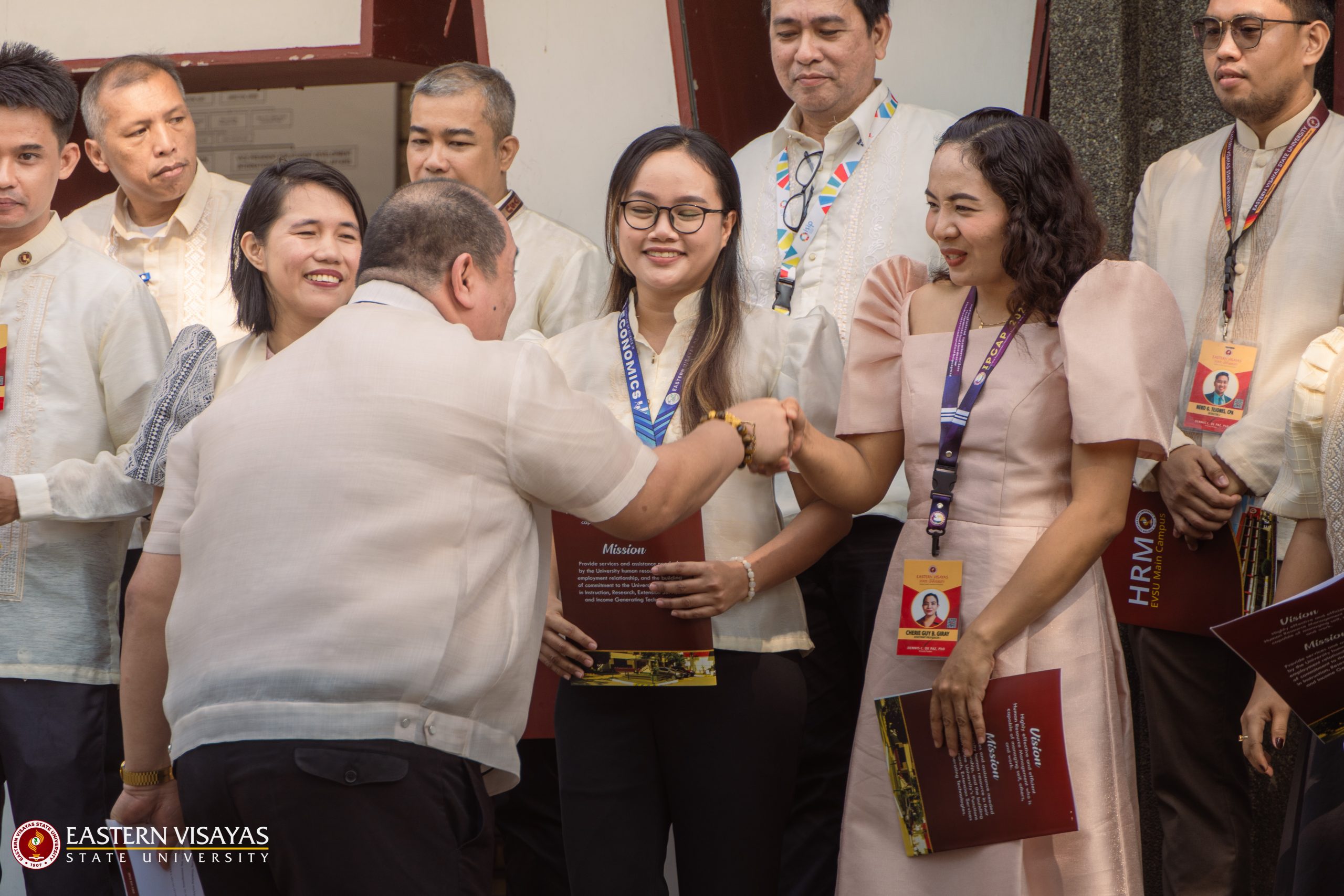 Newly appointed EVSU personnel and promoted faculty take oath during flag-raising
